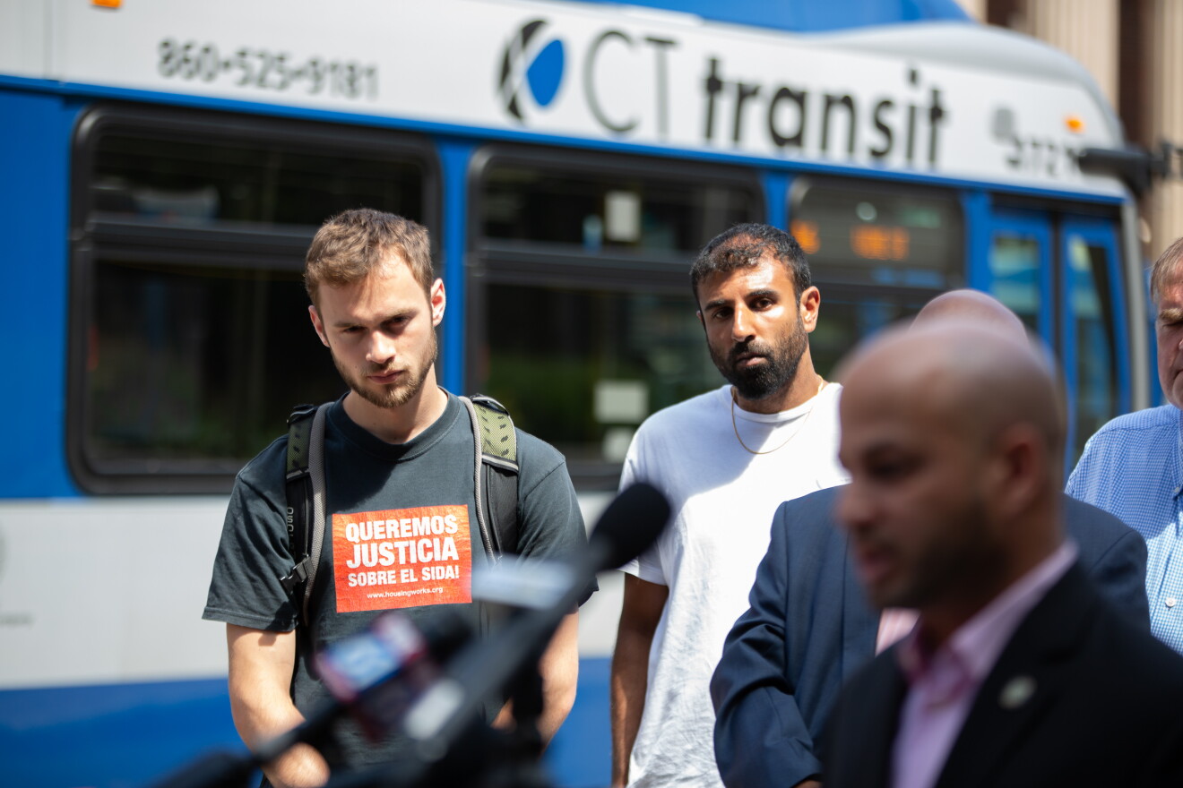 Immigration rights advocates, including Alok Bhatt (center) of the Connecticut Immigrant Rights Alliance, gathered outside the United States Court House in Hartford Mon., June 24.